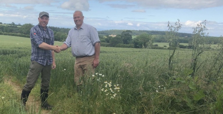 Richard congratulating a farmer for entering the Turtle Dove grant scheme in 2019