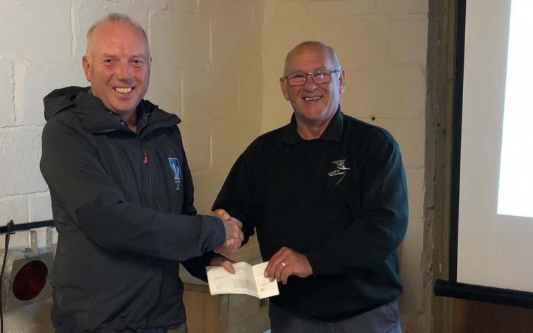 YCN Director Richard Baines making the donation of £500 in 2019 to Spurn Chair Rob Adams